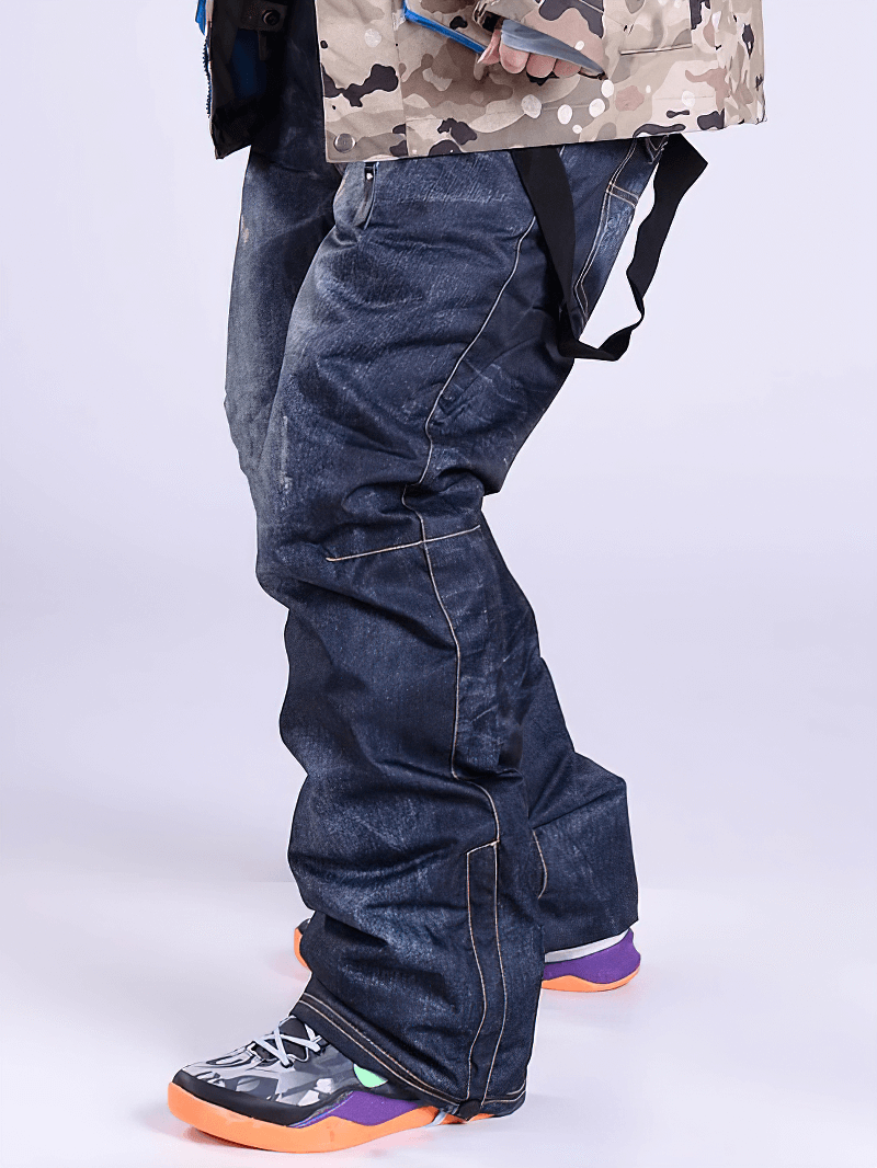 Windproof thermal denim snowboard pants with suspenders for ultimate warmth and comfort in cold weather sports adventure.