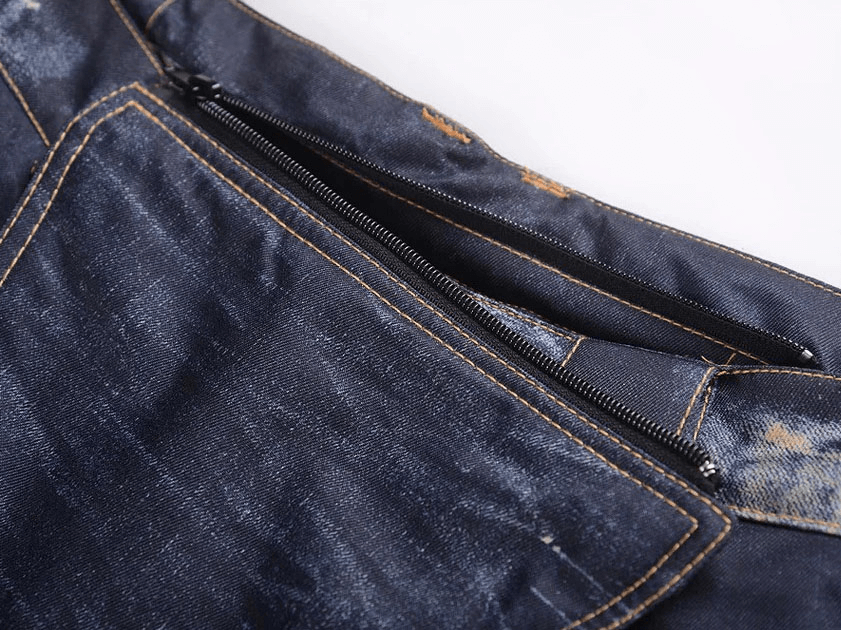 Close-up of zipper fly on windproof thermal snowboard denim pants SF1883, showcasing durable polyester fabric and secure closure.