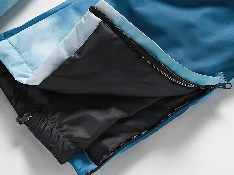 Close-up of the SF1820 windproof ski trousers showcasing durable blue fabric and waterproof zipper for skiing comfort.