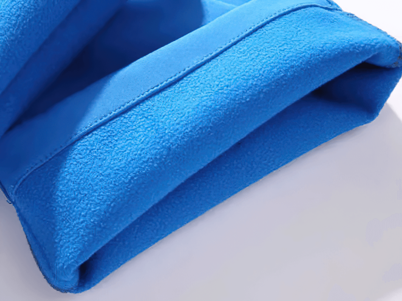 Close-up of blue Windproof Waterproof Kids Soft Shell Outdoor Pants - SF3776 showcasing soft fabric texture.