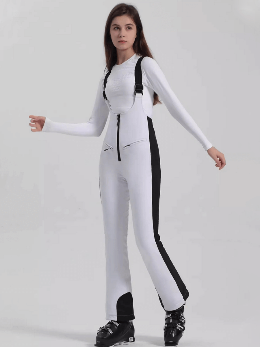 Model wearing white Windproof Waterproof Women's Thermal Pants with zipper, perfect for skiing. Full-length, stylish, and functional.