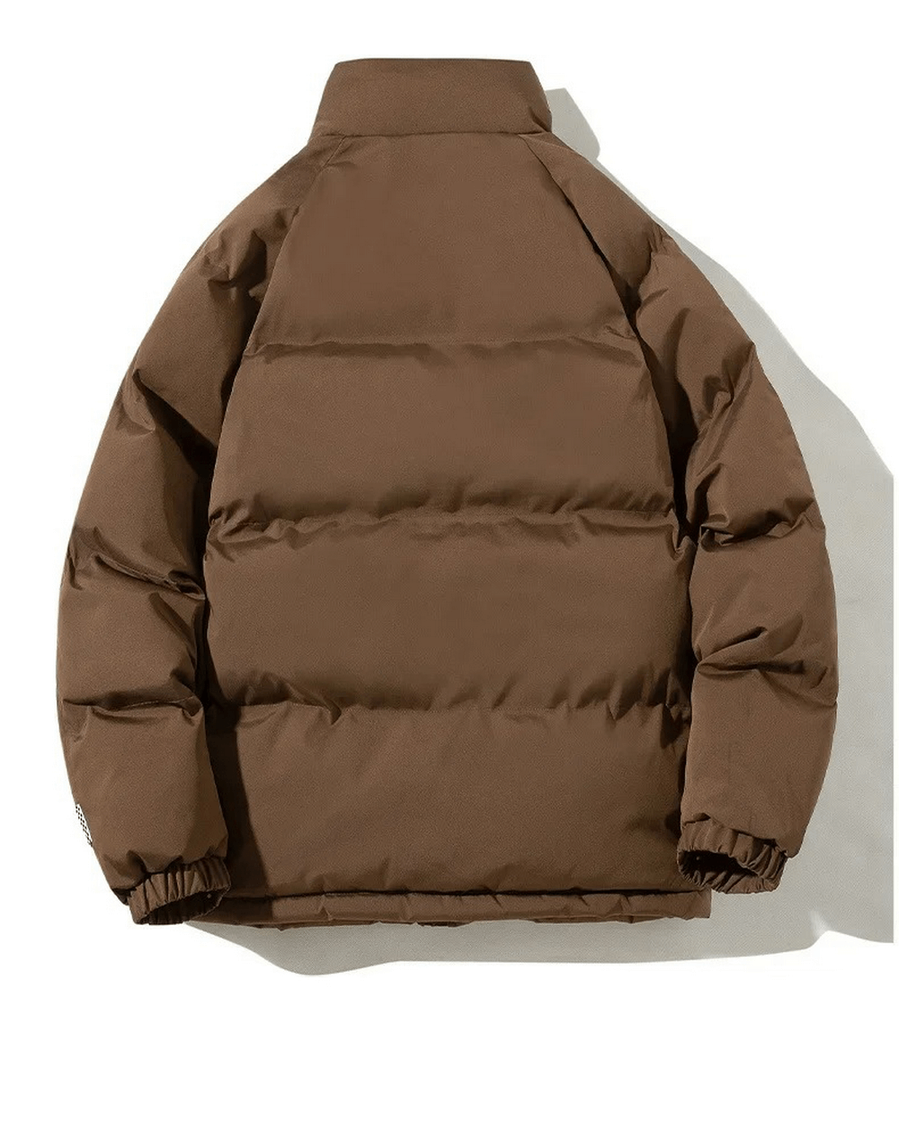 Brown unisex winter puffer jacket, padded with cotton-polyester mix, featuring a warm, cozy design and reliable zipper closure.