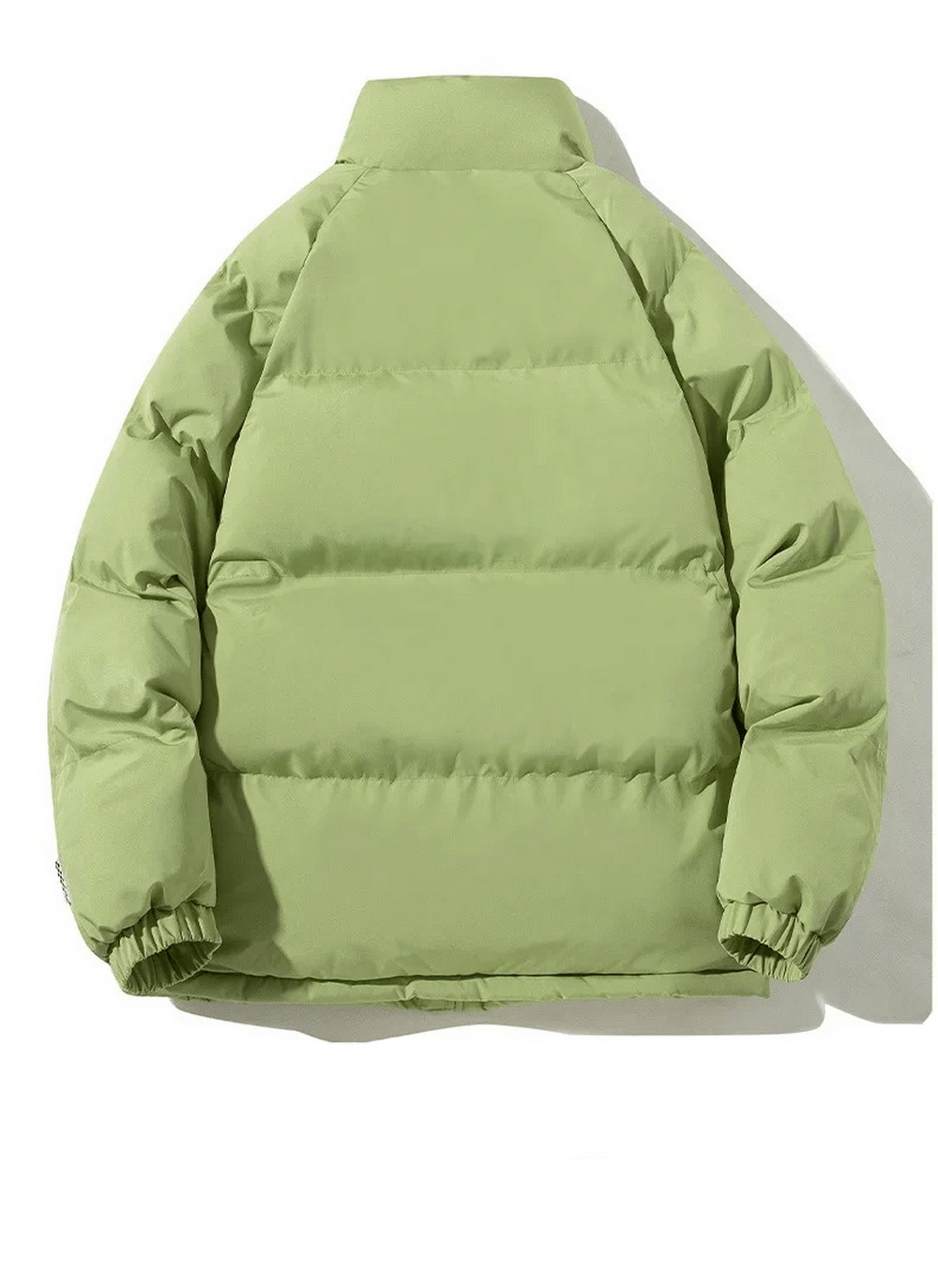 Green unisex puffer jacket, cozy cotton filling, zipper closure, perfect for winter warmth. SF2054 model in trendy design.