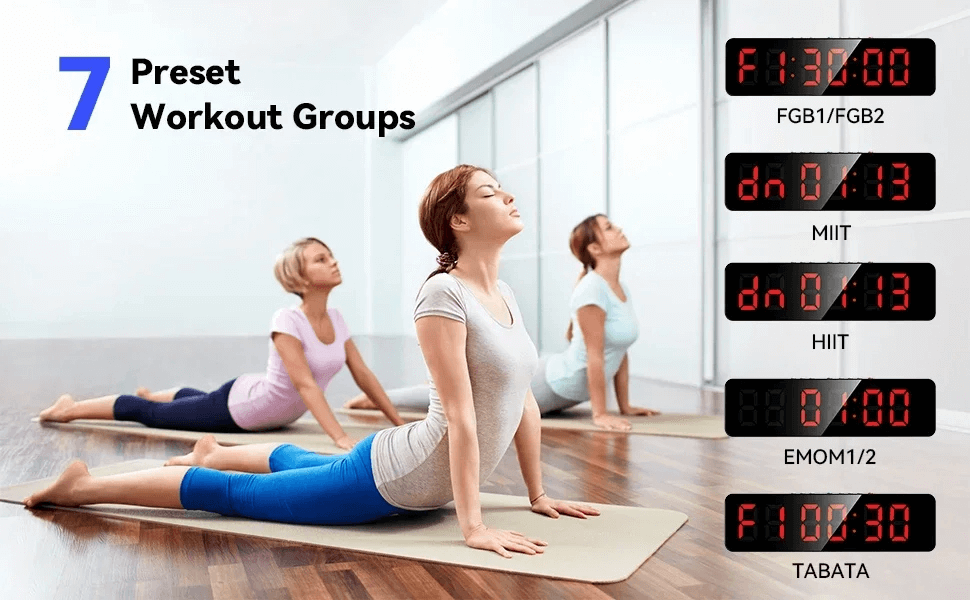 Women practicing yoga indoors with digital clock showing 7 preset workout groups for fitness routines.