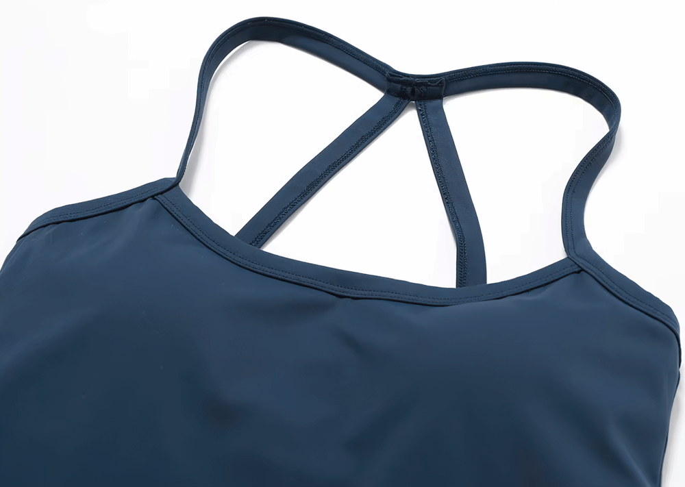 Navy women’s breathable cross-back yoga tank top for fitness, featuring quick-dry nylon and spandex. Perfect for workouts and dance.