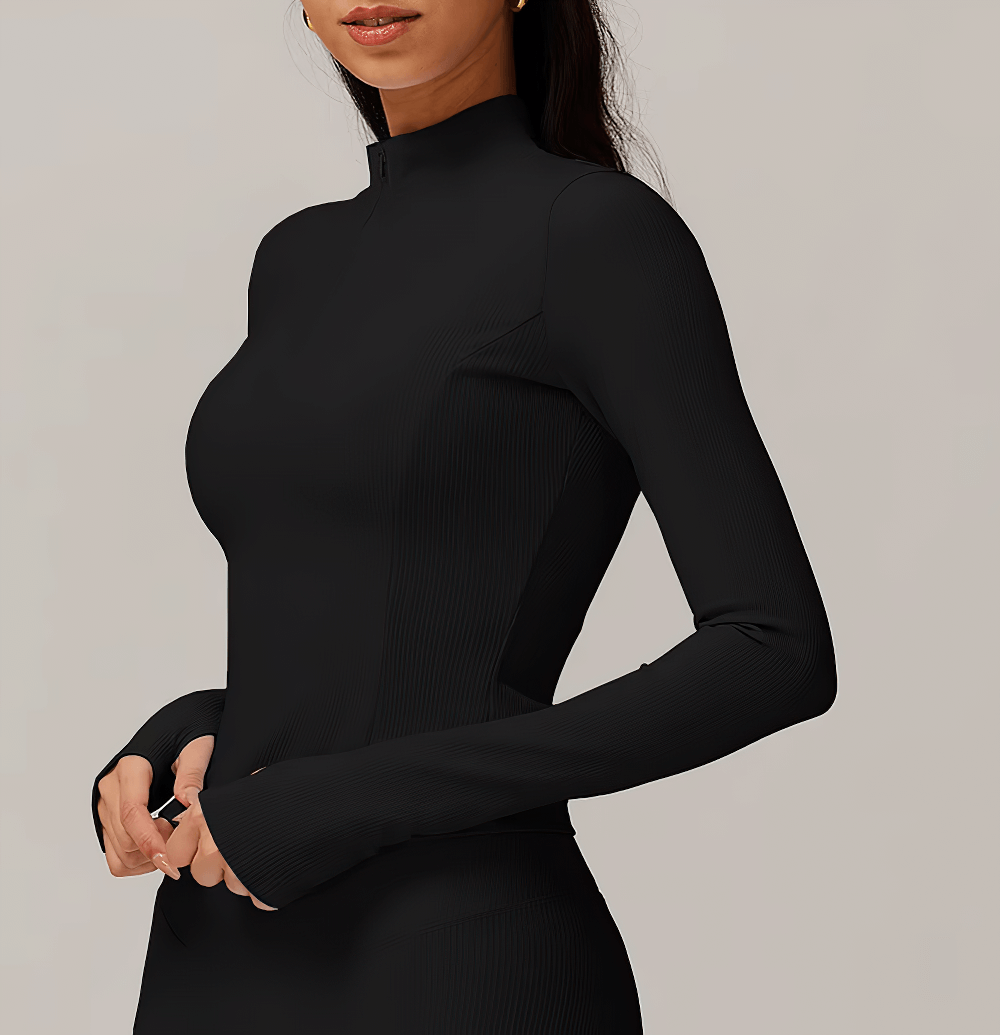 Women's black ribbed zipper long sleeve gym top, stylish and breathable design for running, fitness, cycling, hiking, and dancing.