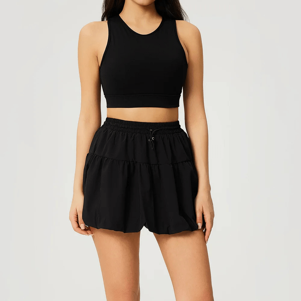 Women's 2 Piece Yoga Set with Crop Bra and Skort - SF4586 featuring a sleek crop top and bubble skort in black.