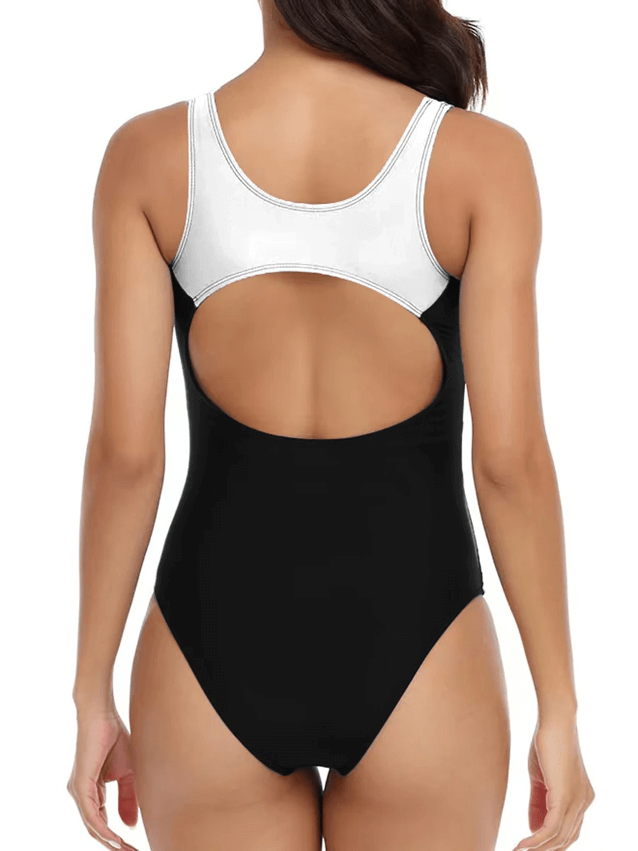 Woman wearing Women's Athletic Patchwork One-Piece Swimsuit SF2150, showing back design; made of polyester and spandex for sporty comfort.