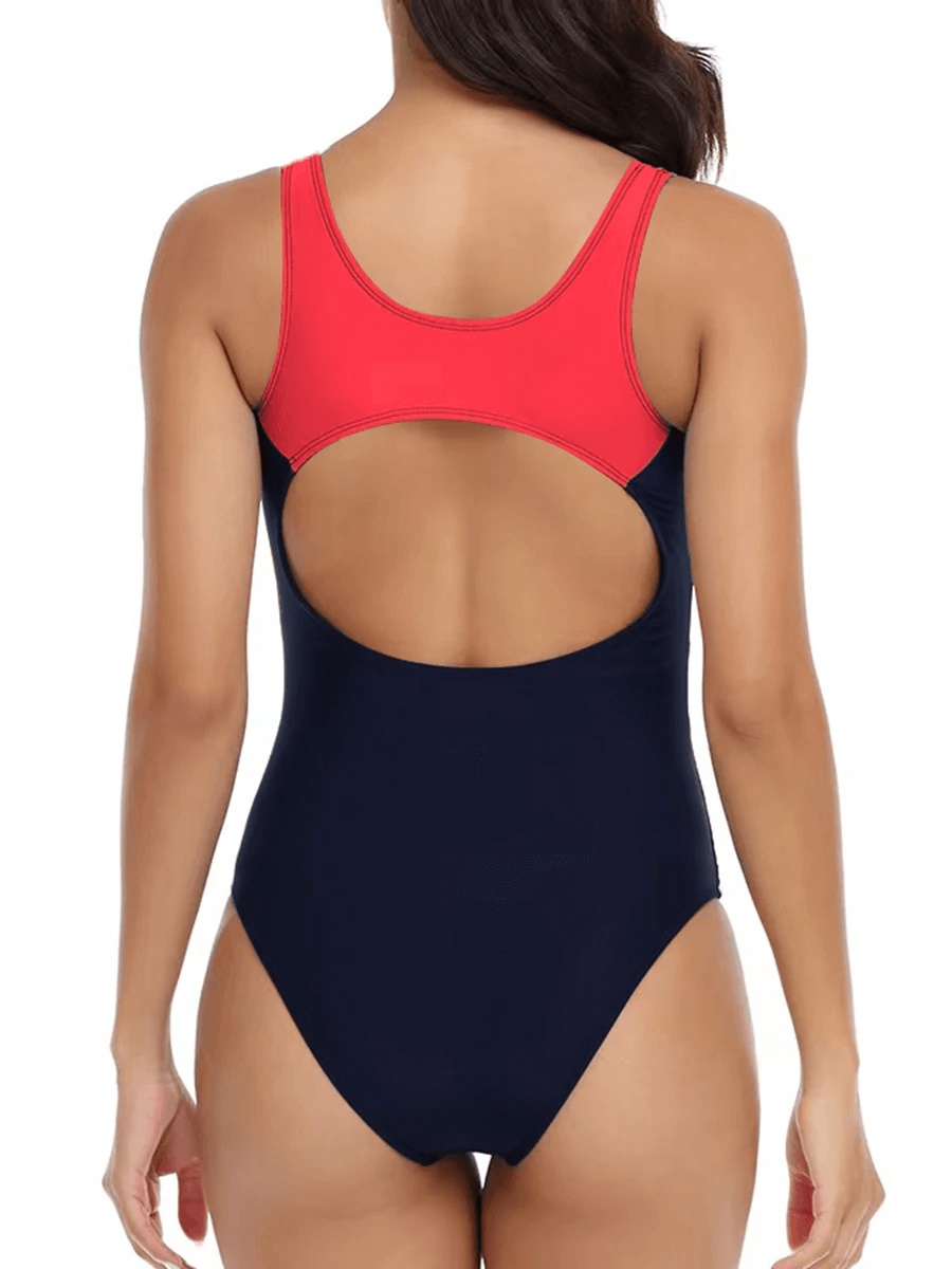 Back view of women's athletic patchwork one-piece swimsuit in navy and red, perfect for sporty swimwear style.
