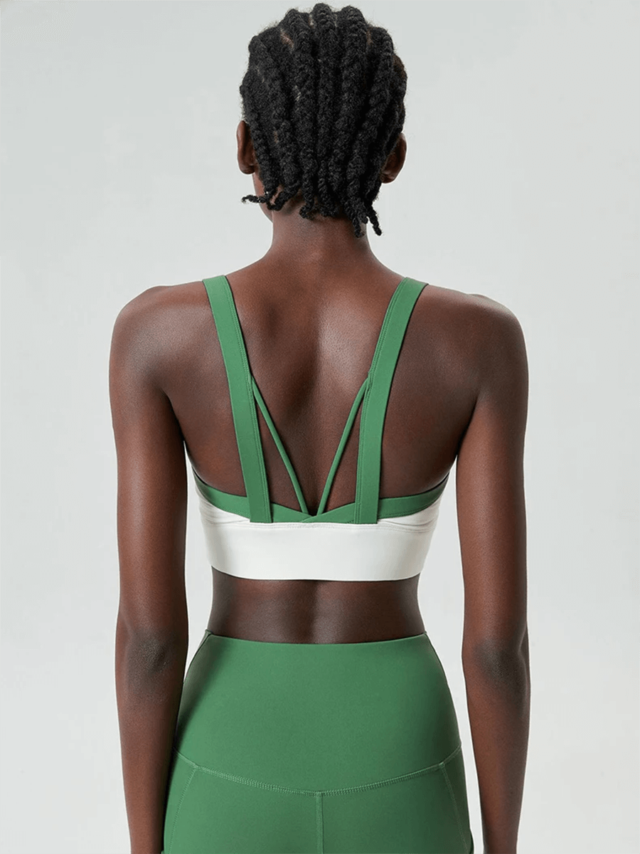 Back view of Women's Athletic Sports Bra Top with unique design for yoga and fitness, featuring green and white two-tone style – SF2091.