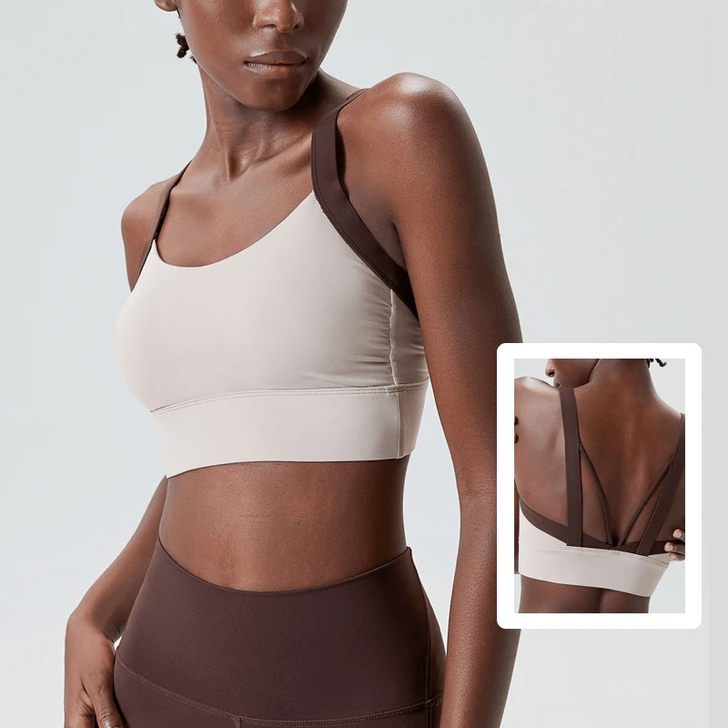 Women's athletic two-color sports bra SF2091 with unique back design, perfect for yoga and fitness, offering sleek style and support.