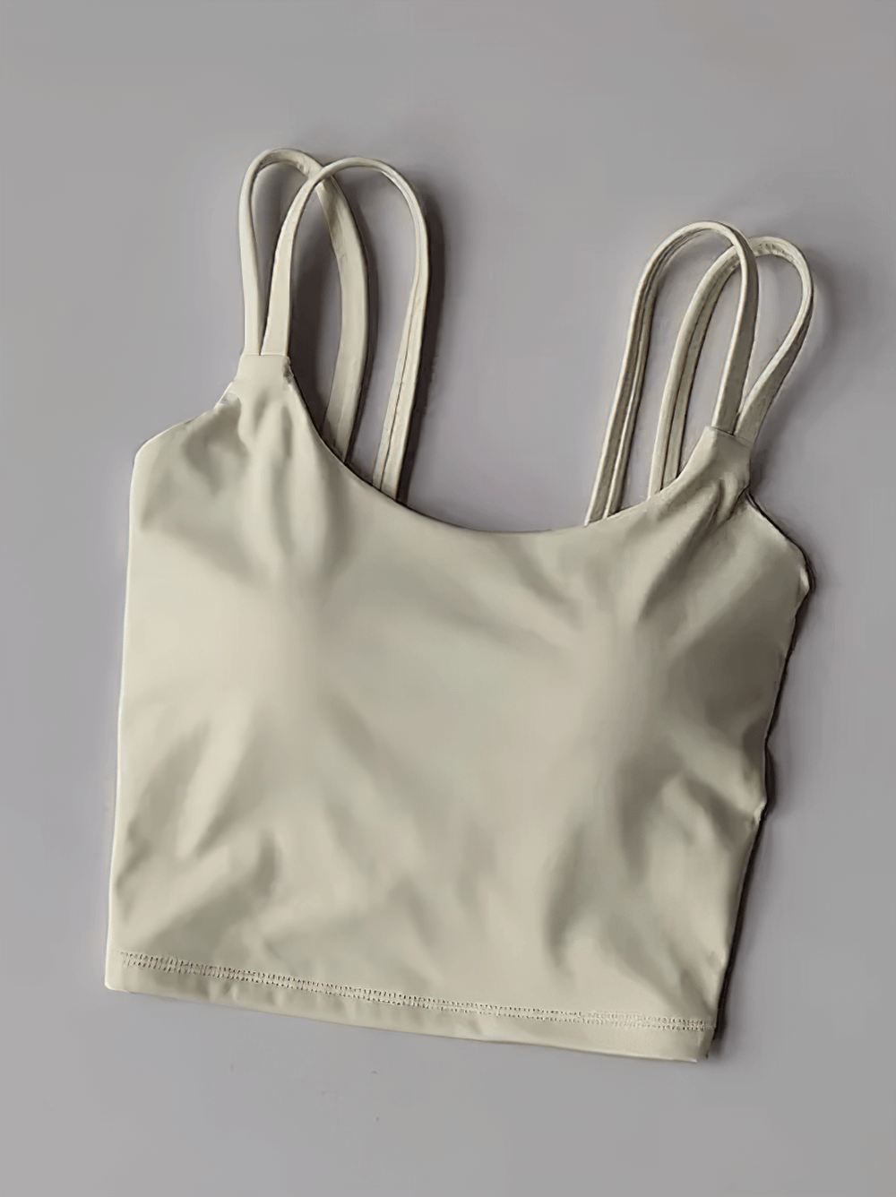 Women's Back-Knot Yoga Sports Bra with Fixed Pads - SF4061 sleek push-up design for yoga and gym sessions. Stylish knotted back fitness top.