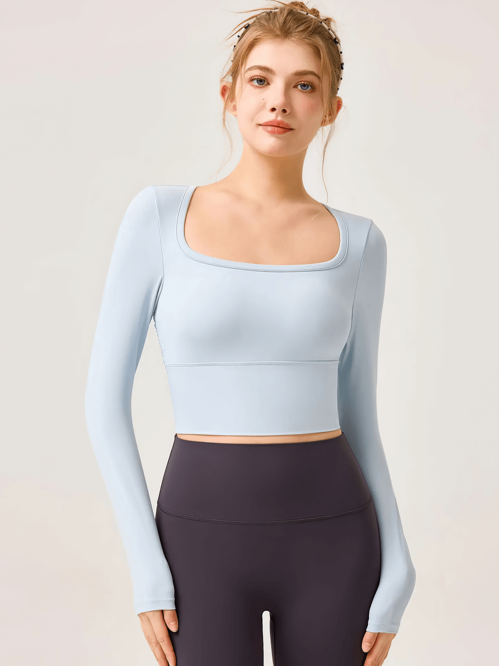 Women's Backless Long Sleeve Yoga Top - SF4188 in light blue shown on model, featuring breathable fabric and full-length sleeves
