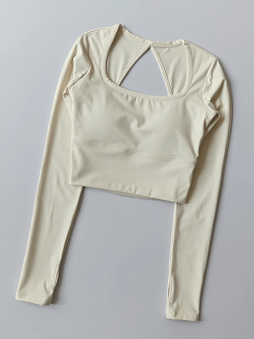 Women's Backless Long Sleeve Yoga Top - SF4188 in cream color, featuring chic design with breathable chiffon and stretchable fabric for active workouts.