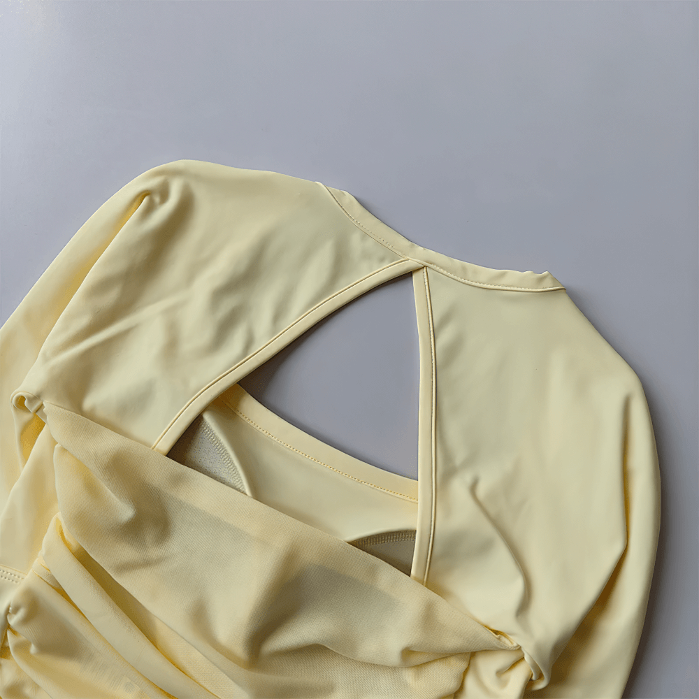 Women's Backless Long Sleeve Yoga Top - SF4188 in yellow with breathable and stretchable chiffon fabric, perfect for workouts.