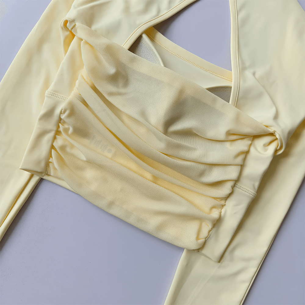 Women's Backless Long Sleeve Yoga Top - SF4188 in soft yellow, featuring breathable fabric, backless design for yoga and fitness.
