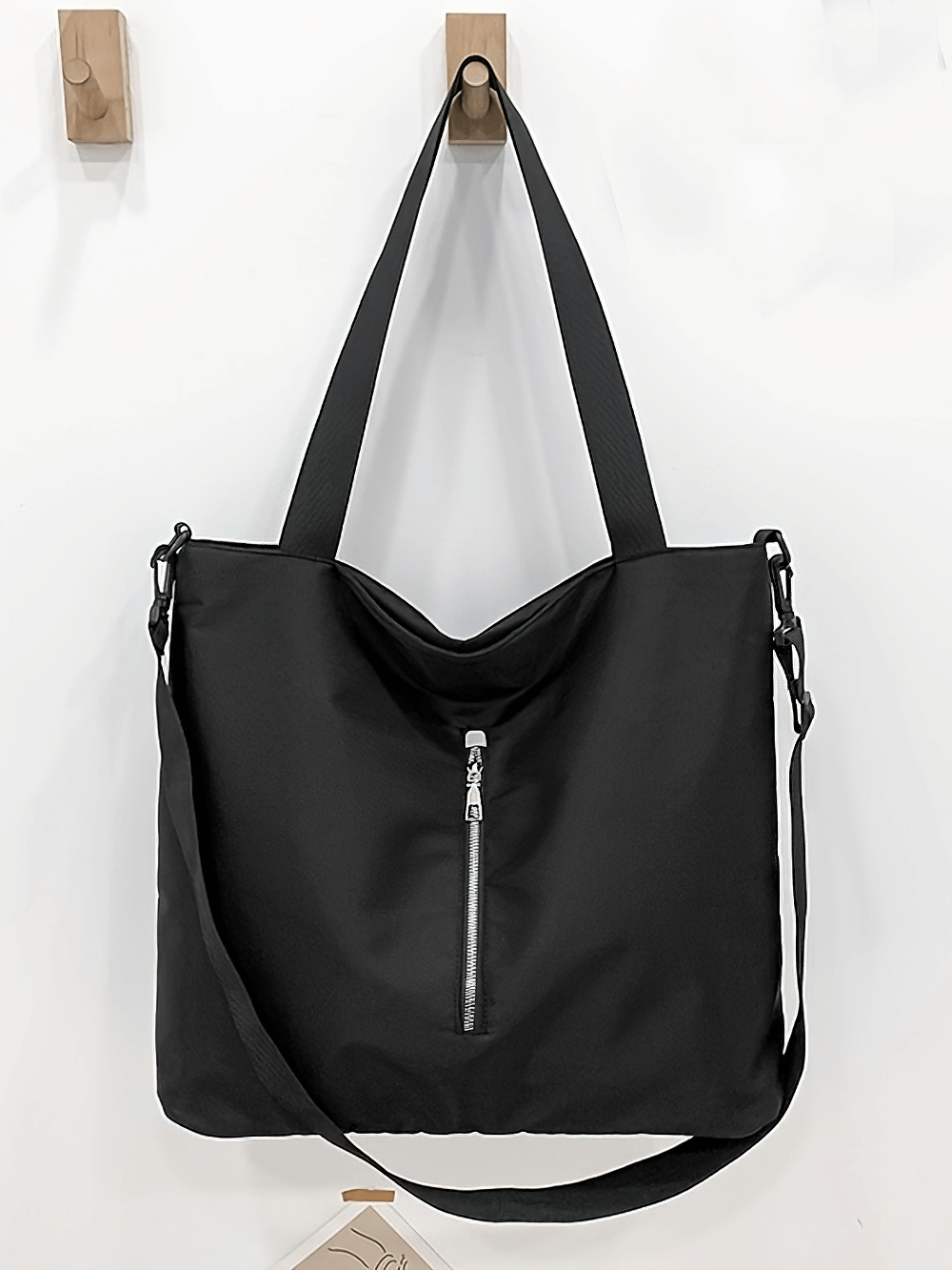 Women's Black Large Capacity Tote Bag SF2664 with adjustable strap and secure zip closure, ideal for travel and everyday use.