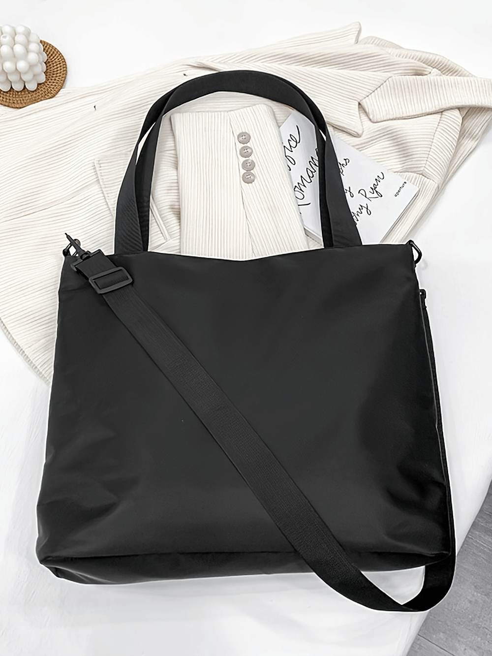 Women's black large capacity tote bag SF2664 with adjustable strap, durable nylon fabric, versatile for travel and everyday use.