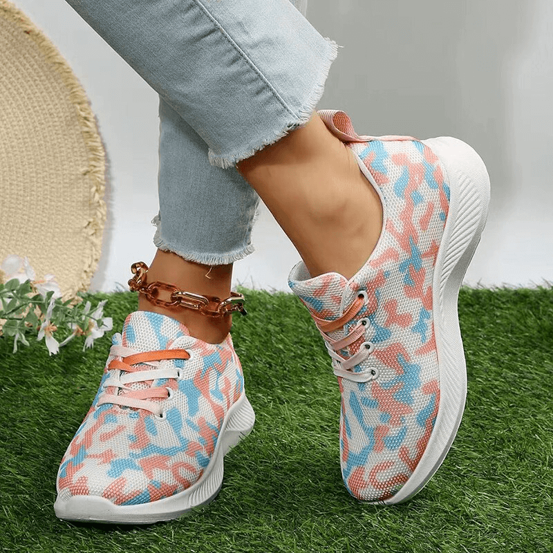 Women's breathable mesh sports shoes in a colorful camouflage pattern, perfect for comfort and non-slip performance during activities.