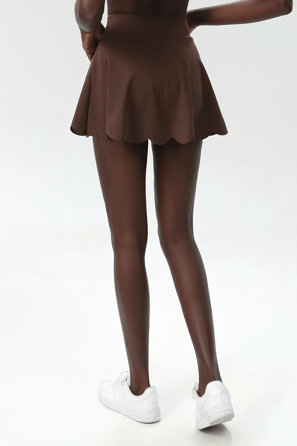 Alt Tag: Women's Breathable Tennis Skirt with Pocket - SF4443 in brown, back view, flowy skirt with pocket, sporty outfit with white sneakers