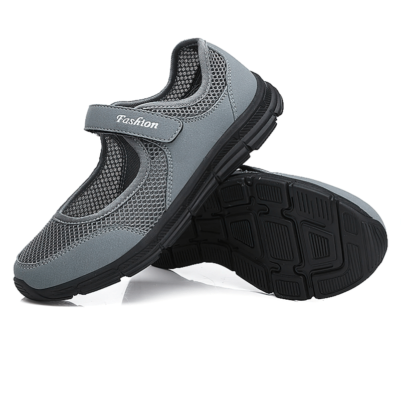 Women's breathable vulcanized flat shoes in grey with mesh upper and hook-and-loop closure, showcasing lightweight design. SF1367.