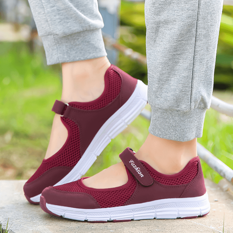 Women's breathable vulcanized mesh sneakers in red with hook and loop closure, flat heel, and lightweight design - perfect for style and comfort.