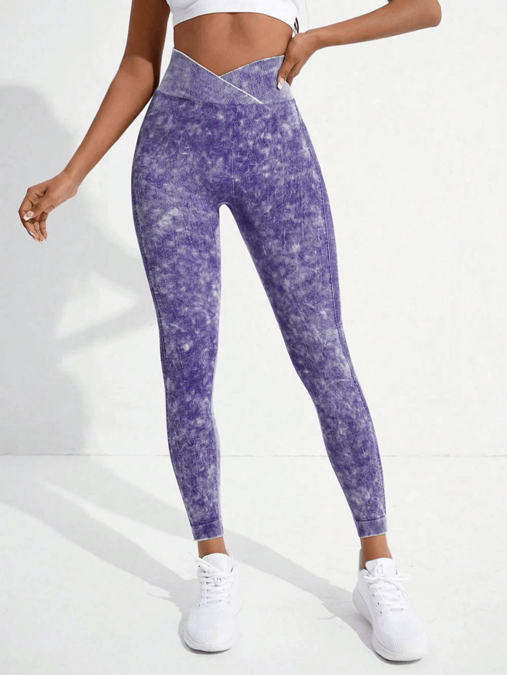 Women wearing Women's Crossover Waist Butt Lifting Leggings - SF4110 in purple for yoga or gym workout