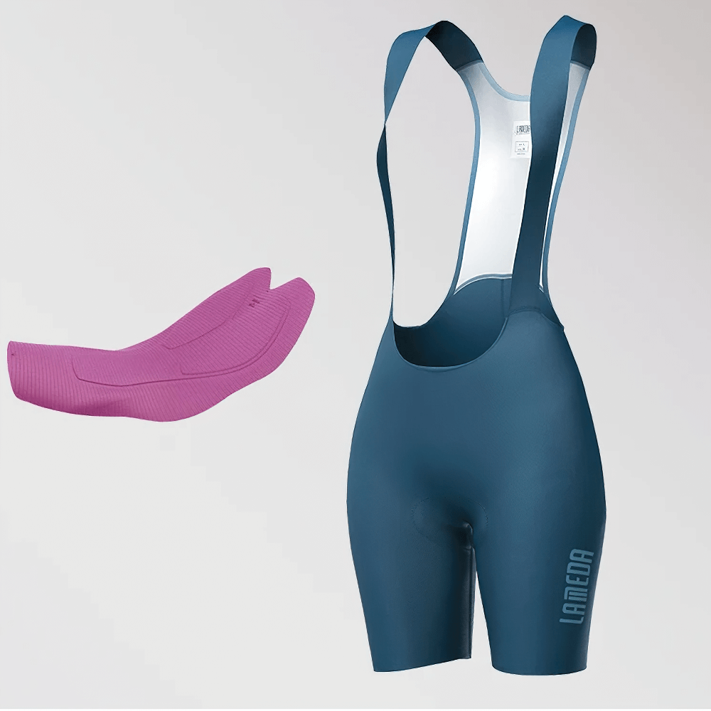 Women's cycling bib shorts with padded insert, durable blue road bike performance wear for enhanced comfort and freedom.