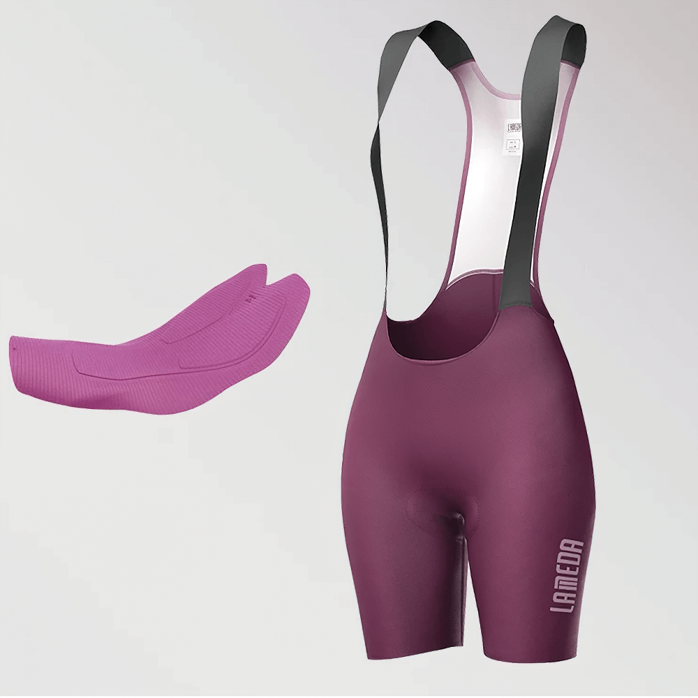 Women's cycling bib shorts with padded insert, durable polyester fabric, designed for performance and comfort on long road rides.