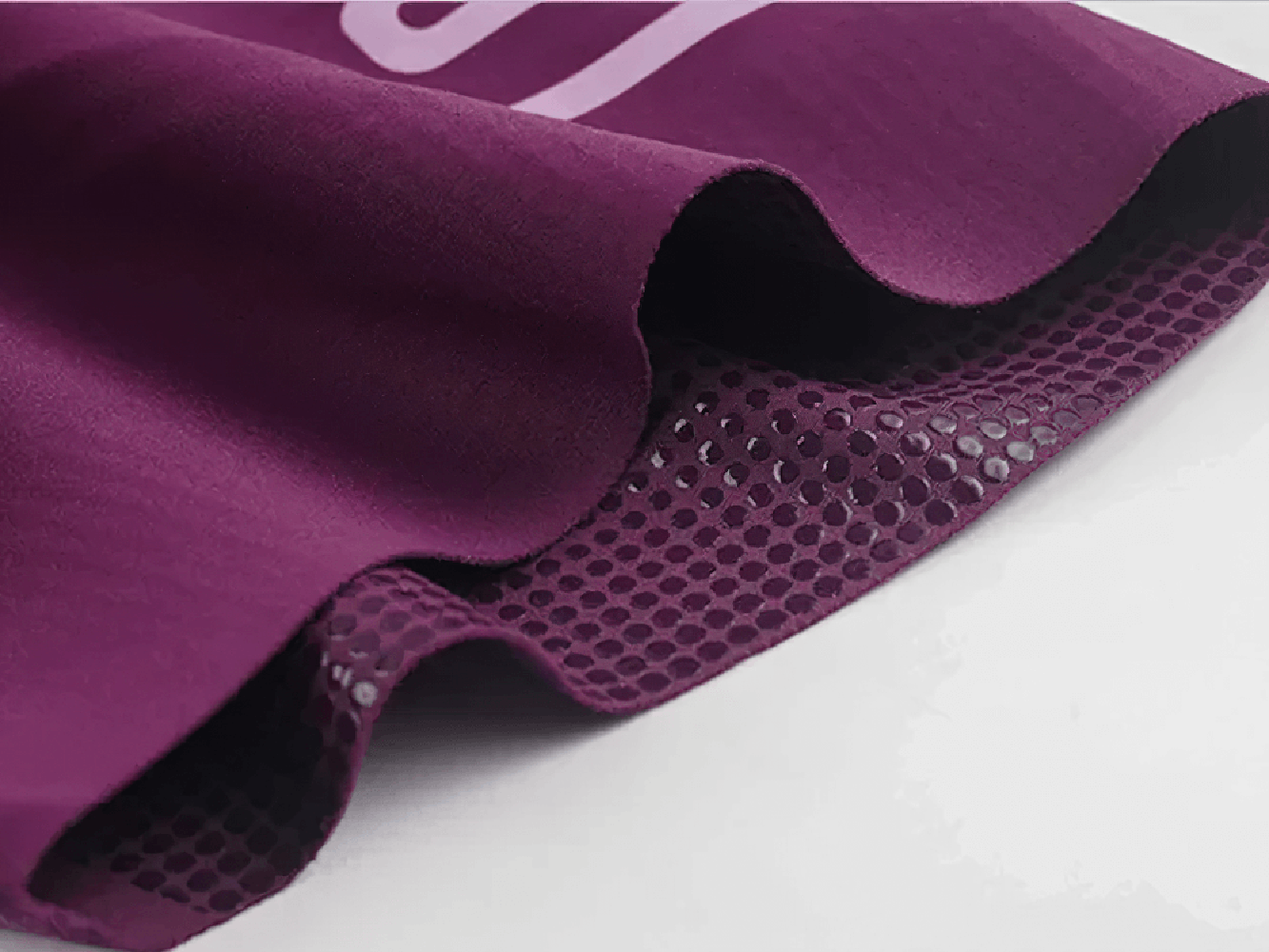 Close-up of durable fabric and padded insert of women's cycling bib shorts SF2576 in purple, designed for performance and comfort.