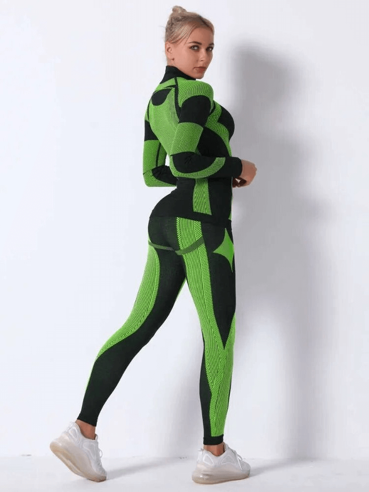 Women's yoga top and leggings set in green and black, made from breathable polyester for comfort and quick drying during exercise.