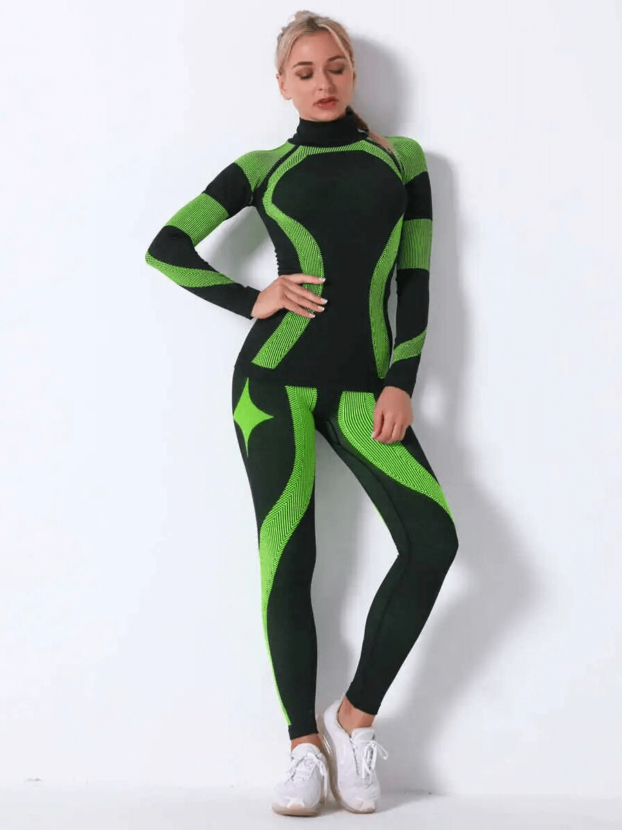 Woman wearing women's elastic leggings and long sleeves top set SF1755, green and black, yoga outfit, polyester, standing pose.