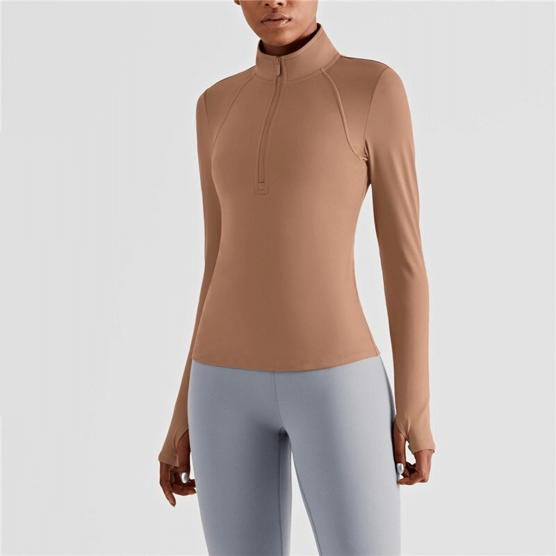 Women's elastic long sleeve fitness sweatshirt with finger cut-outs, beige, anti-wrinkle, and quick-dry design.