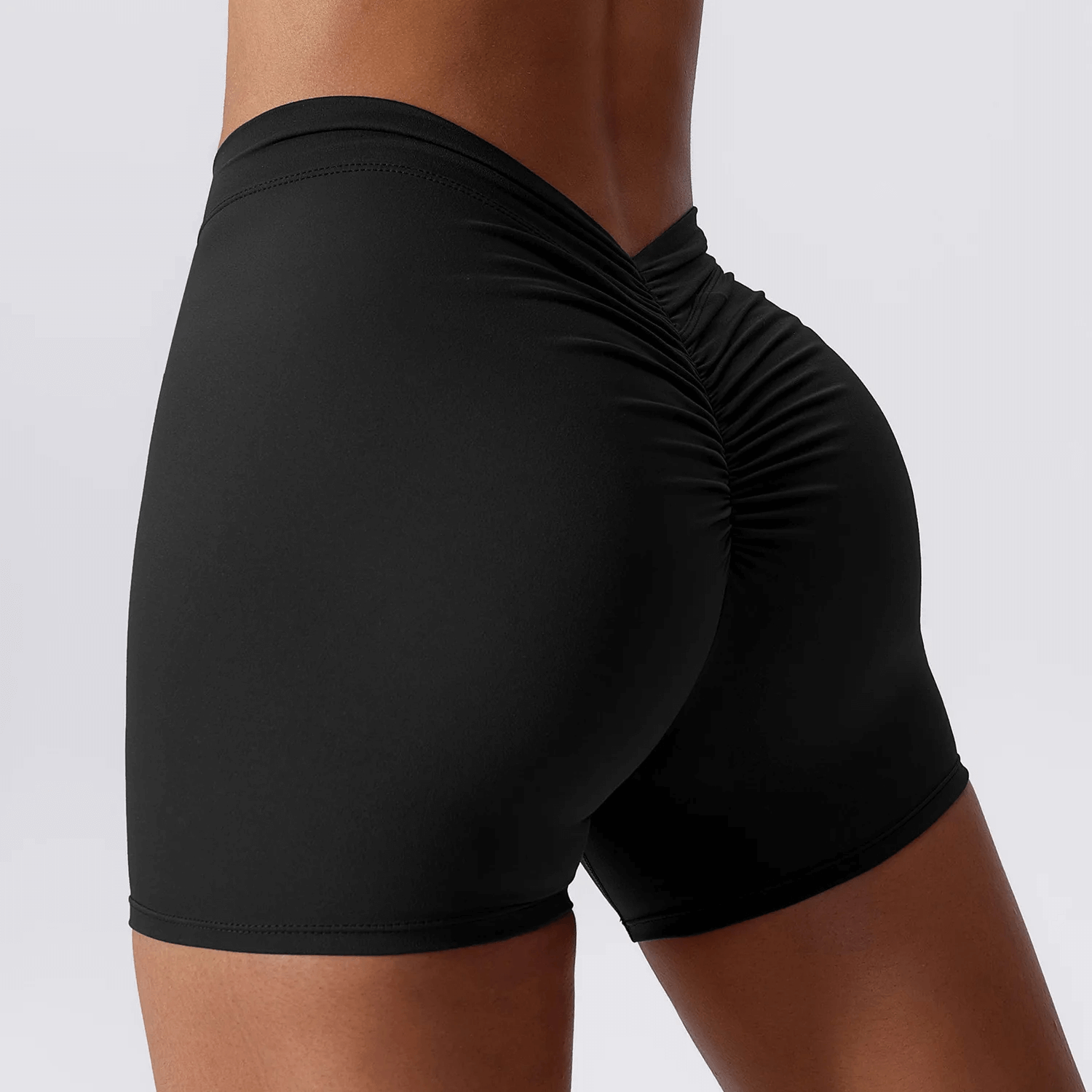 Women's black elastic performance yoga shorts, SF2209, showcasing sleek design for active wear in running, fitness, and cycling.