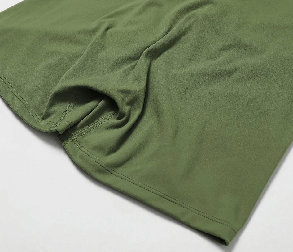 Close-up of Women's Elastic Performance Yoga Shorts - SF2209 in durable green fabric, ideal for active sports and fitness.