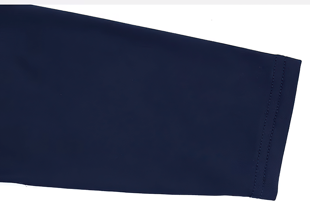 Close-up of sleeve on women's elastic thermal base layer long sleeve top in navy blue, highlighting stitching detail.