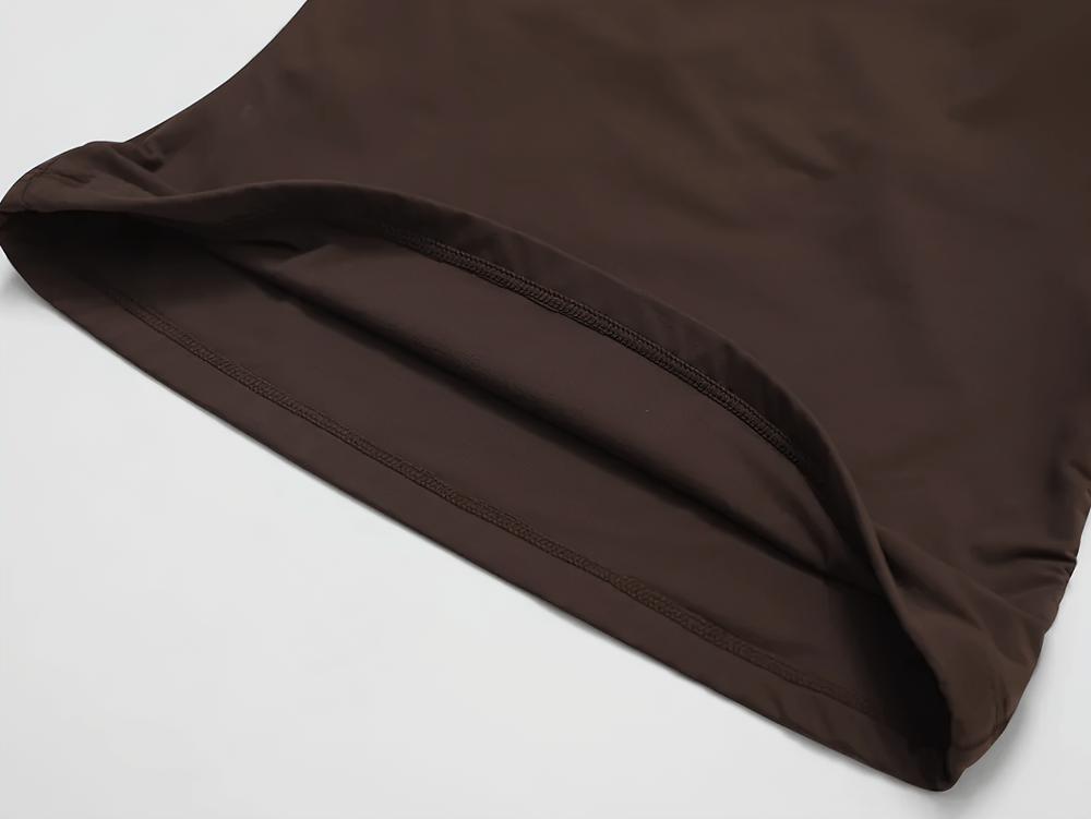 Close-up of brown women's fitted tank top with square neckline, showcasing breathable fabric and sleek design. Perfect for casual styling.