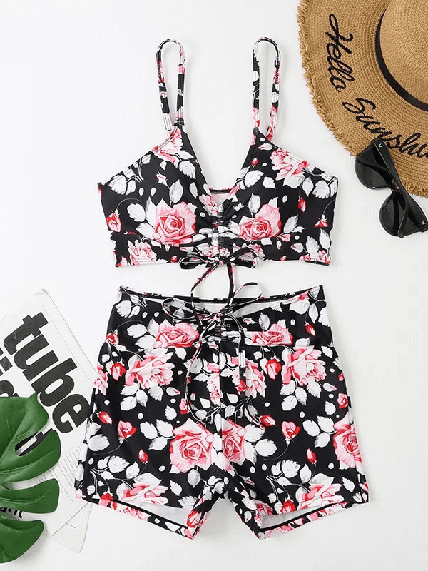 Women's flower print two-piece bathing suit SF1866 with black and pink design, perfect for swimming. Flexible polyester material.