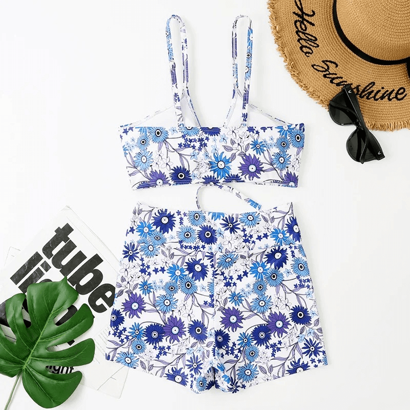 Women's flower print two-piece bathing suit in blue and white, perfect for swimming. Feminine design with elegant floral pattern, SF1866.