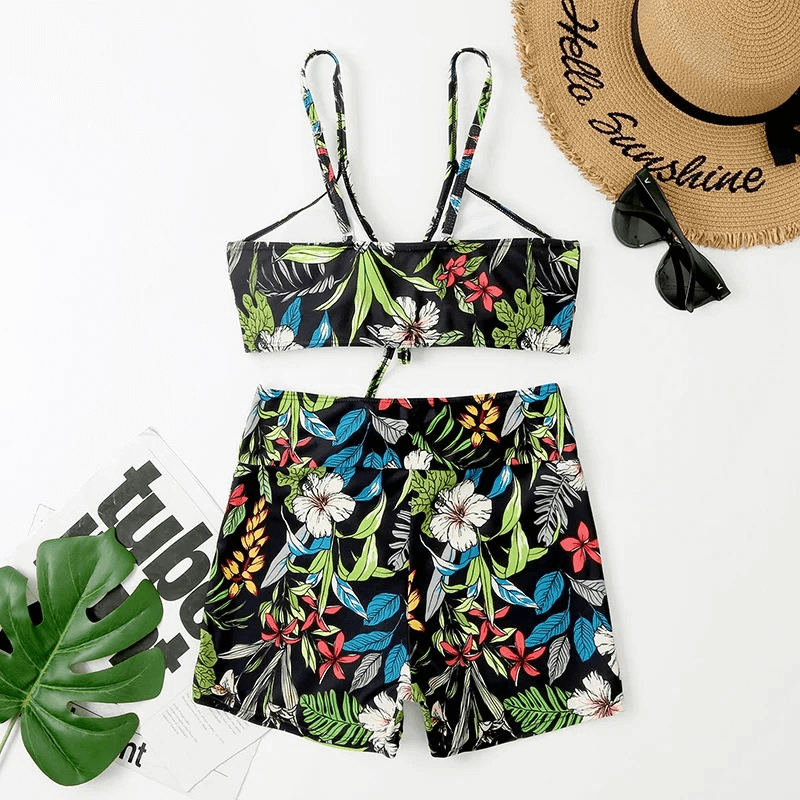 Women's flower print two-piece bathing suit with vibrant floral design, perfect for all-day comfort and style.