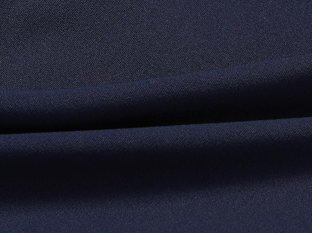 Close-up of dark blue stretchy fabric, ideal for activewear.