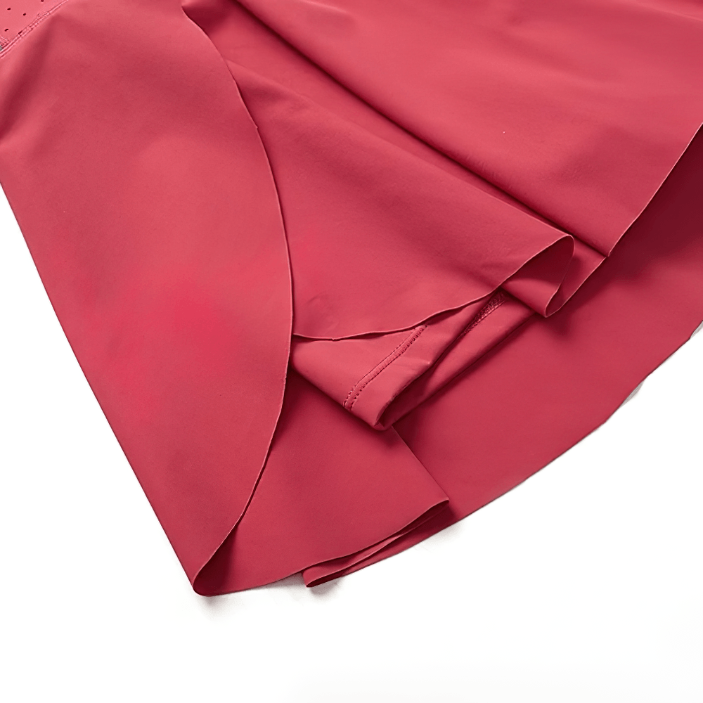 Alt Tag: Women's High Waist Tennis Skirt with Shorts - SF4470 in rose pink, pleated hem skort close-up with built-in shorts