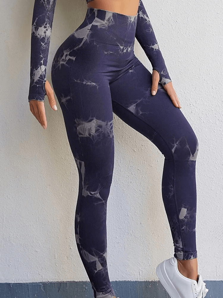 Model wearing Women's High-Waisted Elastic Tight Sport Leggings, SF1744, in blue, showcasing breathable nylon blend and elastic waistband.