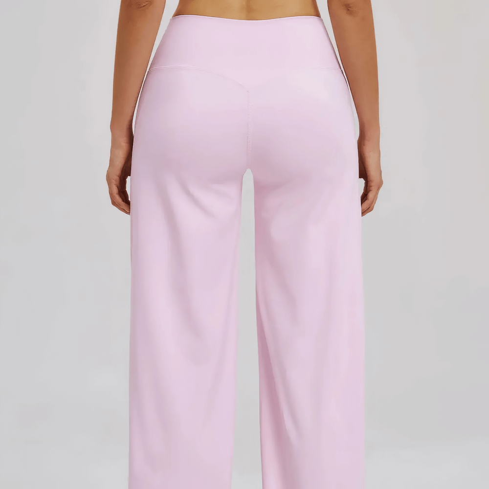 Alt Tag: Women's High-Waisted Flared Yoga Pants - SF4287 back view, light pink full-length loose fit, high-rise waistband, sleek no-pocket yoga pants