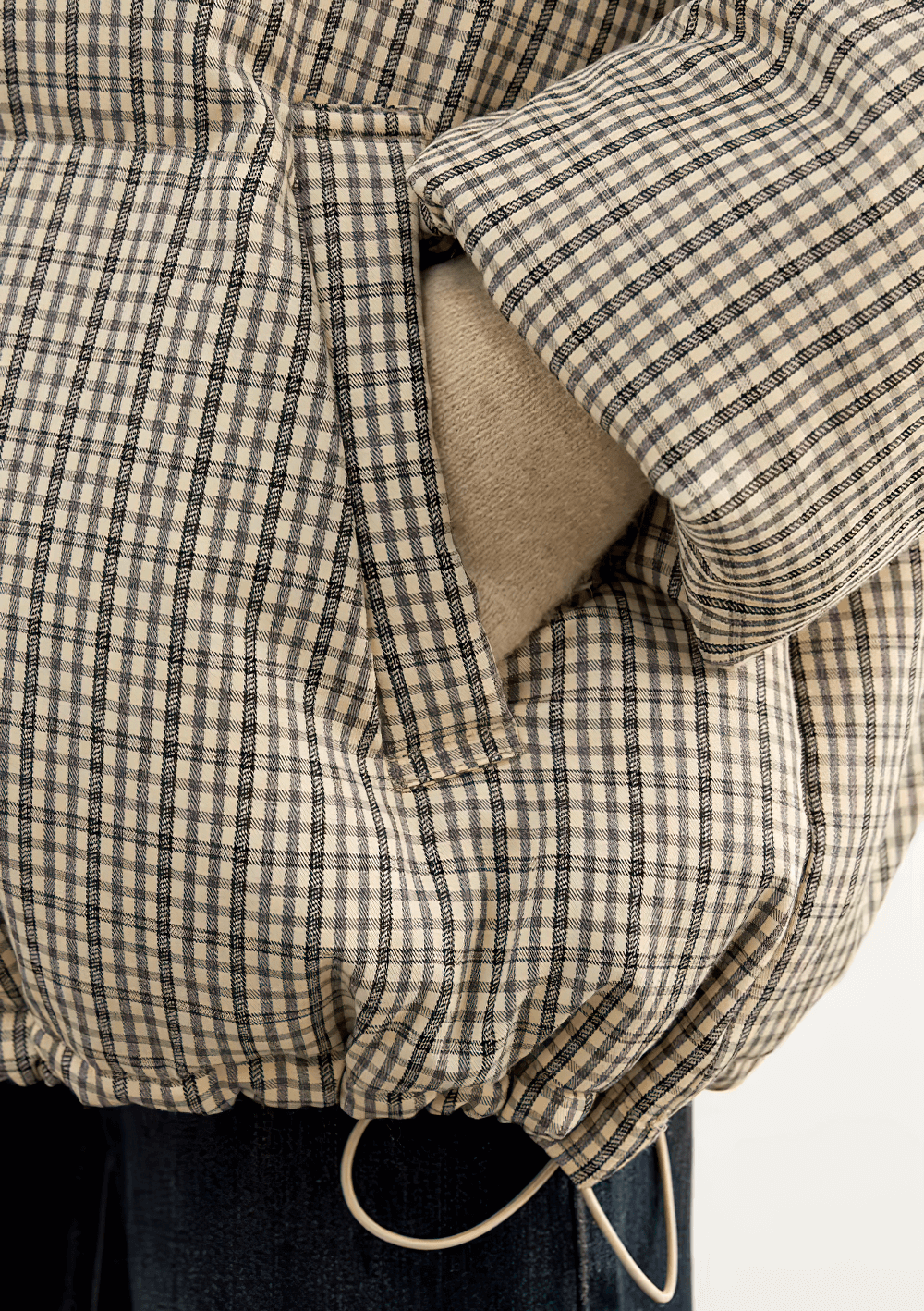 Close-up of Women's Hooded Plaid Down Jacket with pocket, showcasing premium 90% duck down fill, perfect for chic winter warmth.