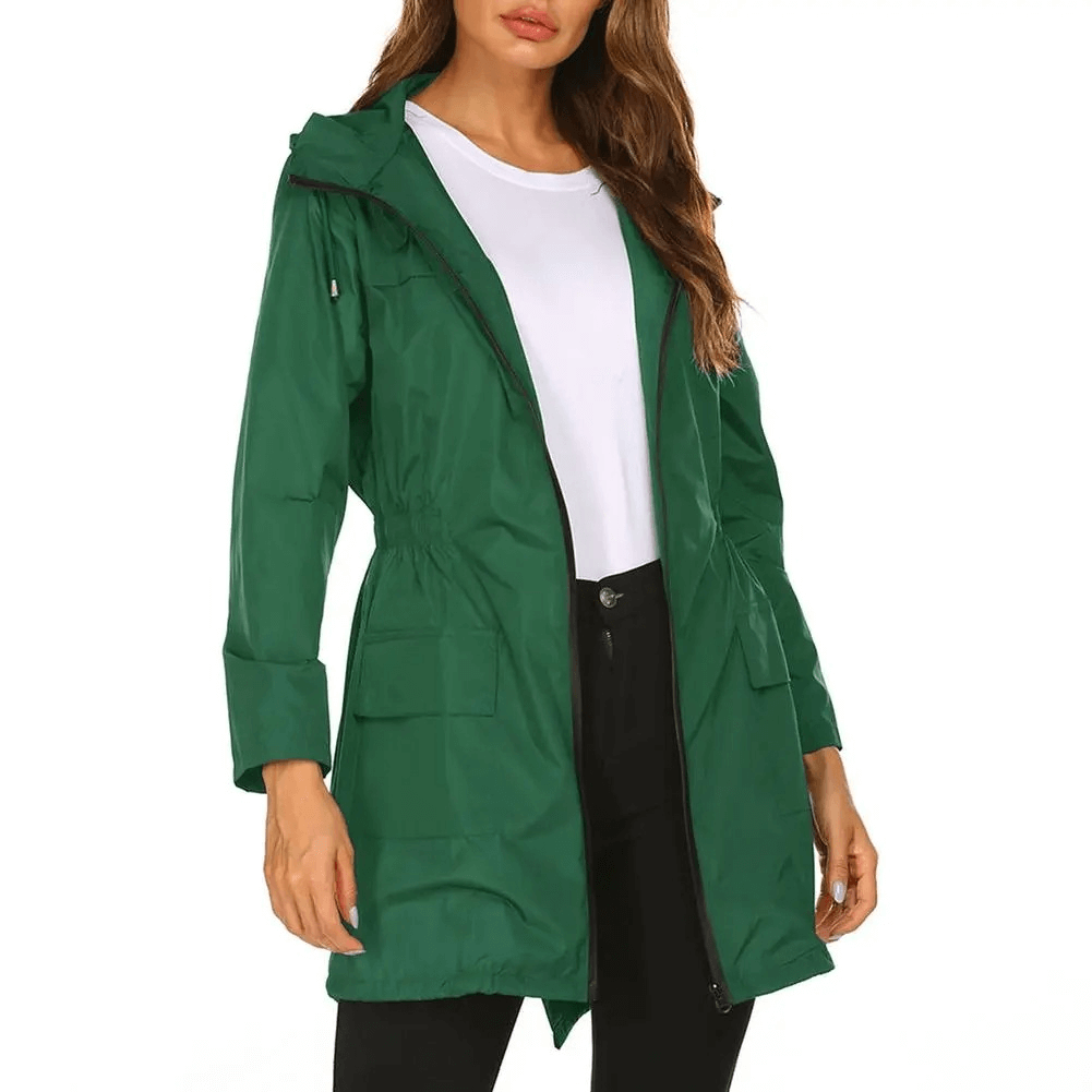 Women's green hooded raincoat SF1926 with zip closure, adjustable hood, and pockets, perfect for stylish protection from the rain.