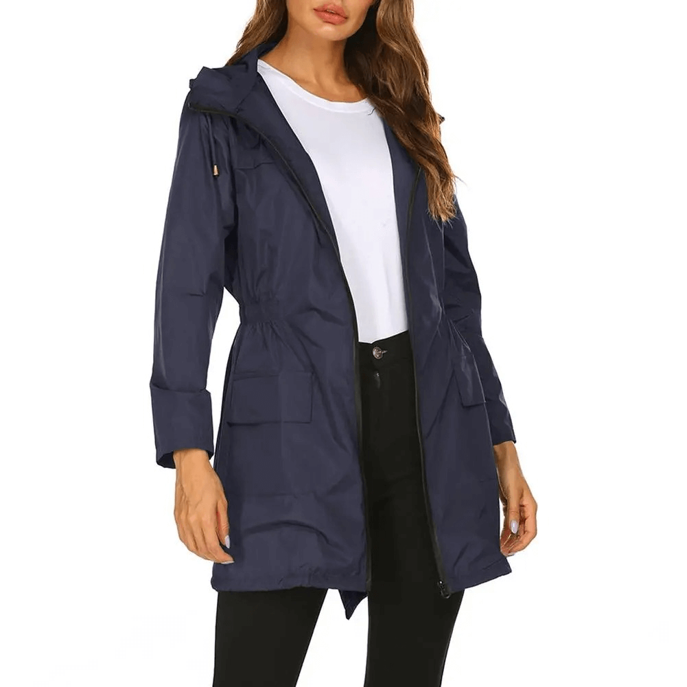 Women's navy blue lightweight hooded raincoat jacket SF1926, featuring adjustable hood, zippered closure, and pockets for convenience.