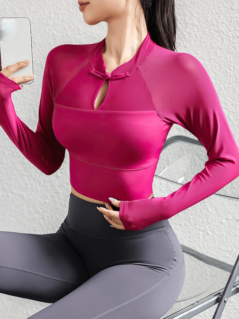 Model wearing Women's Long-Sleeved Crop Top with Breathable Fabric - SF4176, fuchsia color, showcasing sleek fit and flexibility for activewear.