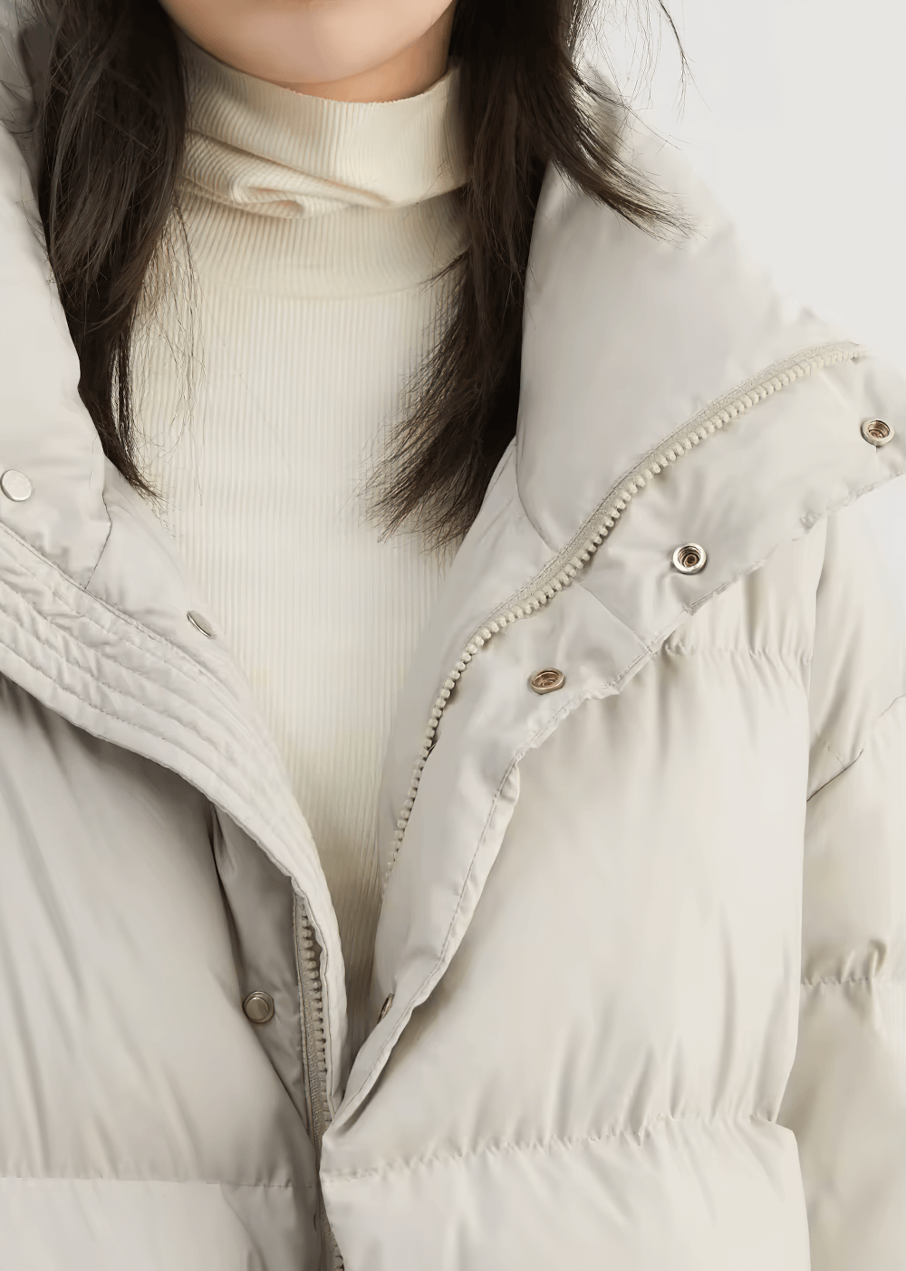 Chic women's stand collar duck down winter jacket in solid color, showcasing warm puff design for casual elegance.