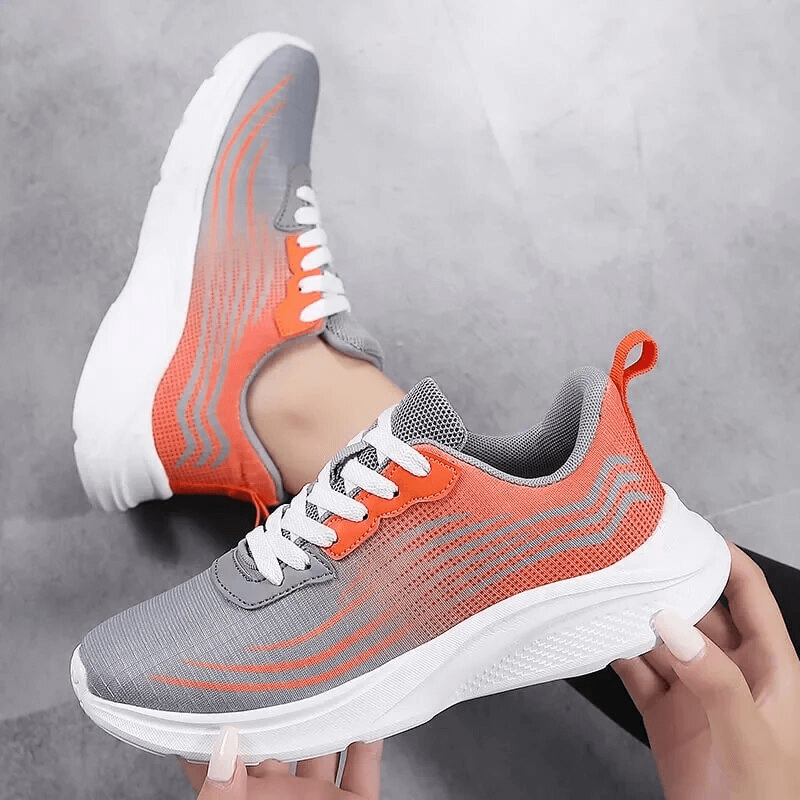 Women's mesh breathable flexible sneakers SF1708 in gray and orange with PVC outsole, ideal for sports and comfort.